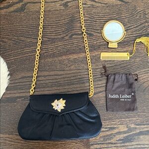 Judith Leiber Black Clutch with Gold Chain and Star Accent